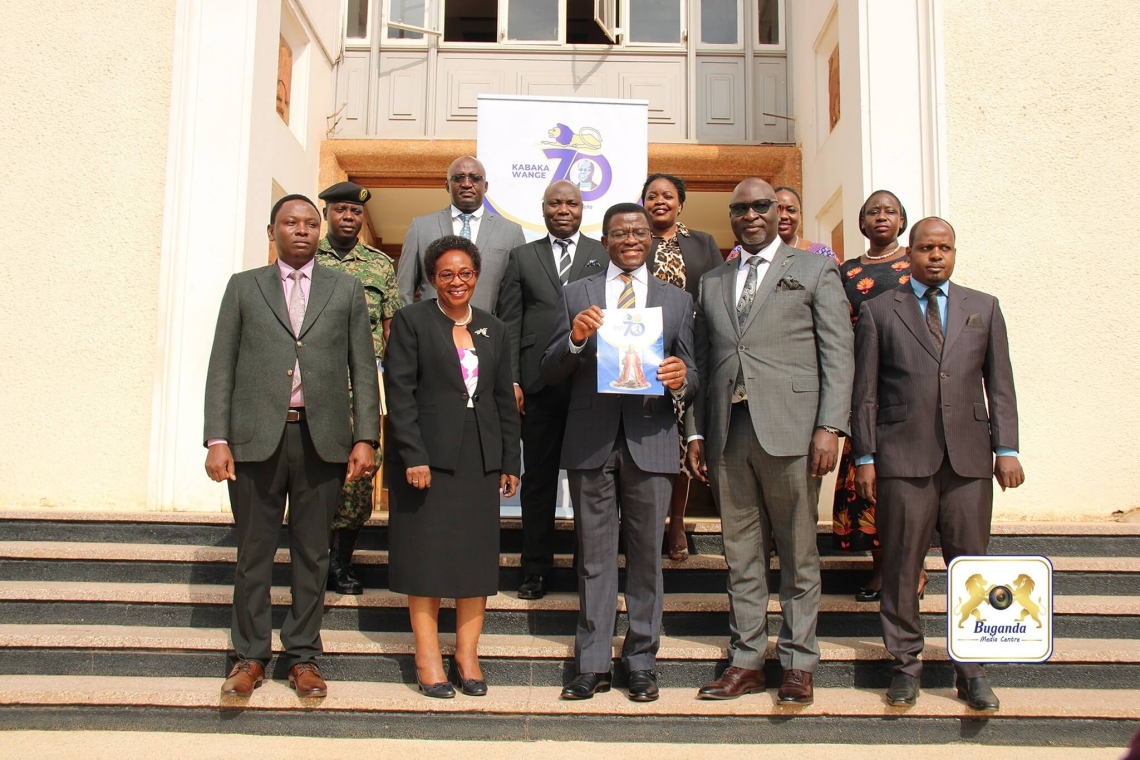 Katikkiro Mayiga (centre) with members of the organizing committee. To his right is Owek. Robert Waggwa Nsibirwa, with Owek. Israel Kazibwe Kitooke further right. To his left is Owek. Choltilda Nakate Kikomeko, among other committee members Image